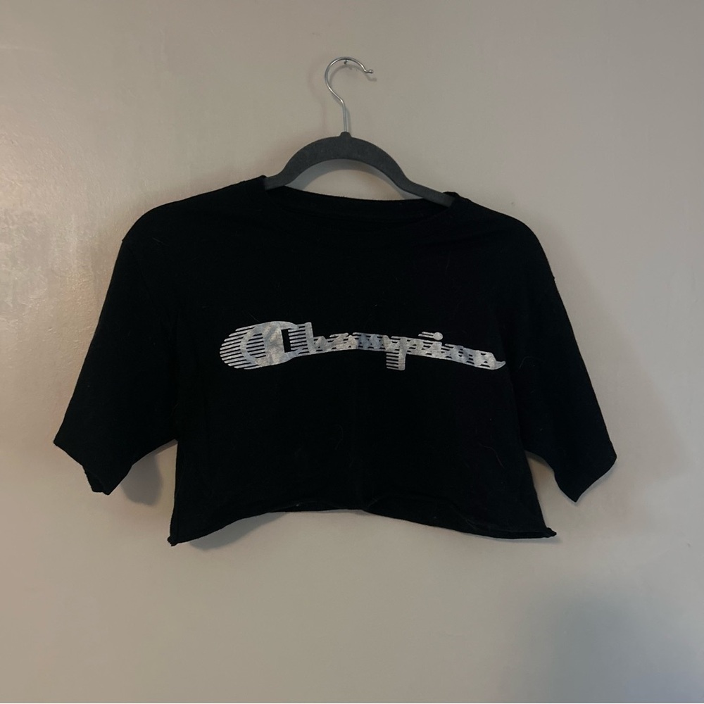 Champion Black Tee with White Logo and Red/Blue Emblem